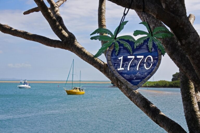 Seventeen,Seventy,Sign,On,Tropical,Tree.the,Town,Is,Built,On